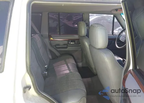 1996 Jeep Cherokee Country z USA, uszkodzony, nr VIN 1J4FJ78S4TL143410